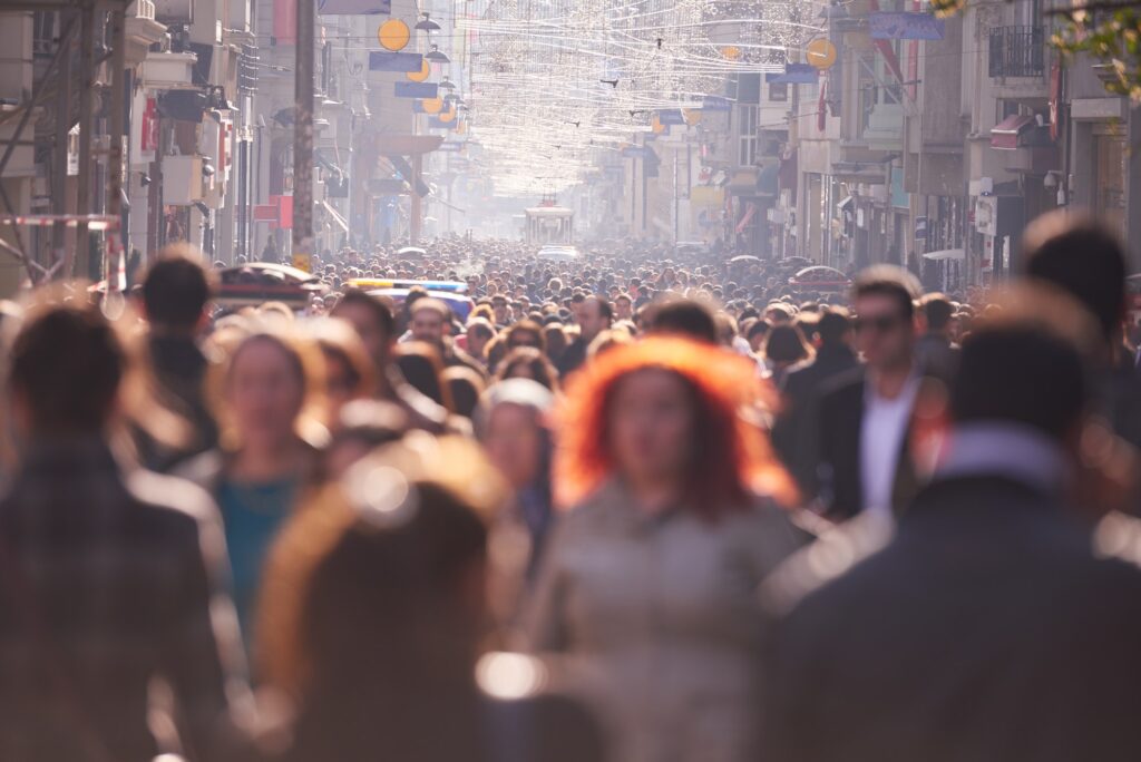 people crowd walking on street